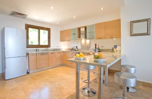 Peyia Town Apartment | Luxurious, top floor apartment with infinity pool. and stunning panoramic views