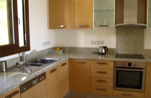Peyia Town Apartment | Luxurious, top floor apartment with infinity pool. and stunning panoramic views