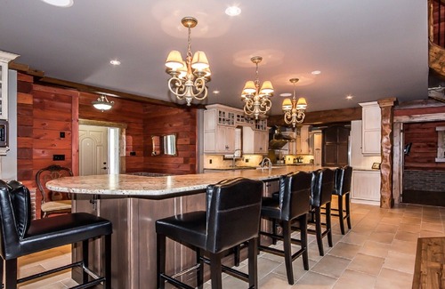 Skead Ski Chalet | Luxurious Waterfront Log Home Vacation. Fishing/Beach. Disconnect to Reconnect!