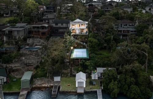 Oatley House | Luxurious Waterfront Retreat with Tennis Court