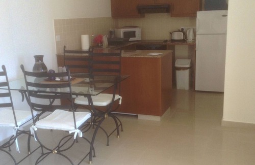 Peyia Town Apartment | Luxury 1 bedroom apartment (sleeps 4) with shared pool