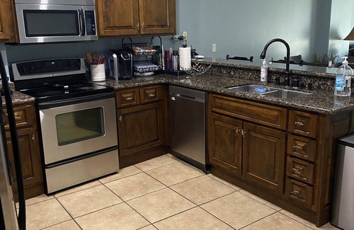 Sandy Beach Condo | Luxury 1 bedroom condo 3 minute walk to the beach. B103