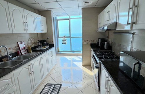 Rumailah Apartment | Luxury 2 bedrooms front beach sea view amazing WiFi, gym, pool, sauna, hammam