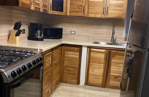 San Cristobal Apartment | Luxury 2BR 2BA APT W. AC & Garage