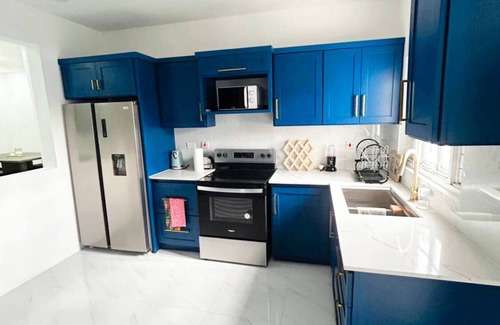 New Kingston Apartment | Luxury 3 bed 2 bath in the heart of New Kingston. Very central & safe Gated.