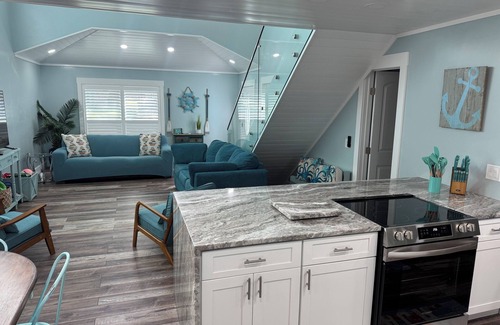 New Smyrna Beach House | Luxury 3BR Townhouse Walk to Beach Pet-Friendly Boat Parking Sleeps 10