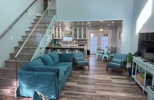 New Smyrna Beach House | Luxury 3BR Townhouse Walk to Beach Pet-Friendly Boat Parking Sleeps 10