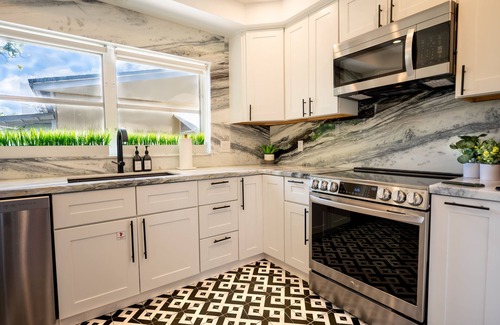 Lauderdale Beach House | LUXURY 4 BD BEACH HOME- 500 Feet to Beach, Heated Saltwater Pool w/Waterfall