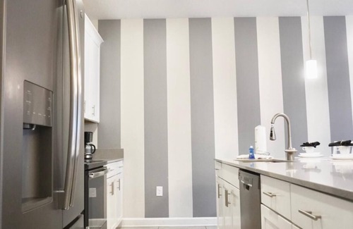 Downtown House | Luxury 4 Bedroom Retreat Near Disney 340