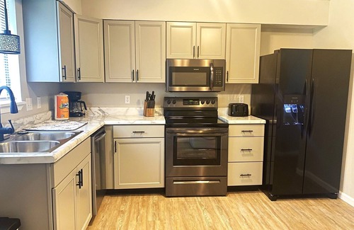 Pineville Condo | Luxury 4 bedroom Villa 103 with river access