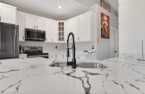 Montbello House | “Luxury 4BR Denver Retreat, Sleeps 10+, Entertainment & Prime Location”