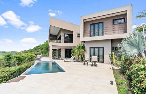 Potrero House | Luxury 5BR Oceanview Villa with Infinity Pool, King Beds, and Sunset Views Over Playa Prieta