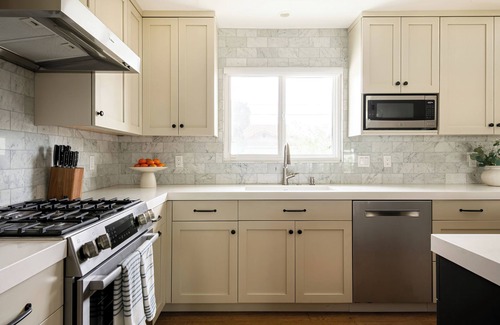 University City House | Luxury 5BR w/Resort Backyard, Huge Hot Tub, Fire Pit, Game Room, Putting Green