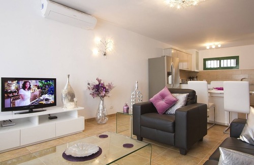 Puerto del Carmen Apartment | Luxury apartment, large private sun terrace, full UK TV, WiFi, immaculate pool.