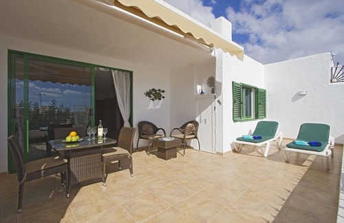 Puerto del Carmen Apartment | Luxury apartment, large private sun terrace, full UK TV, WiFi, immaculate pool.