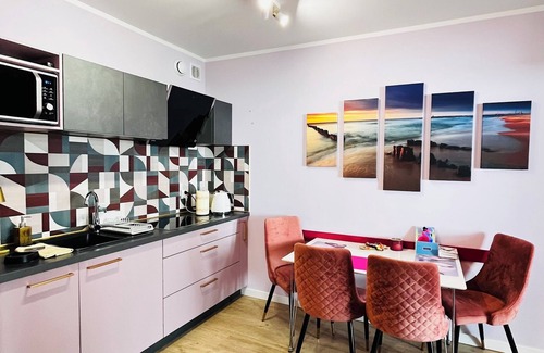 Dzielnica Uzdrowiskowa Apartment | Luxury apartment with private 17sq terrace swimming pools saunas gym playground