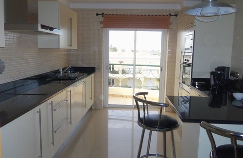 Porto de Mos Apartment | Luxury Apartment with Sea view, shared Pool and Gardens, Sleeps 6