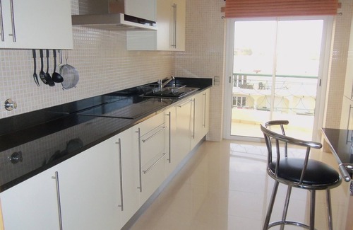 Porto de Mos Apartment | Luxury Apartment with Sea view, shared Pool and Gardens, Sleeps 6