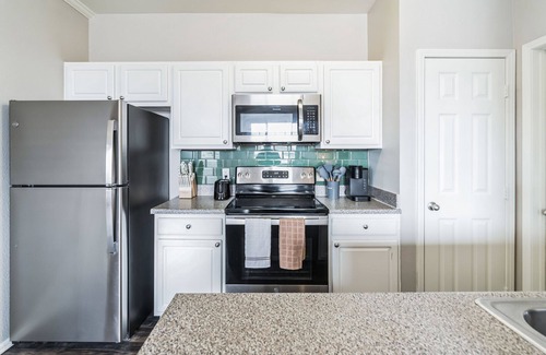 Briargate Apartment | Luxury Apt, Gym, Pool, Attached Garage, Spacious