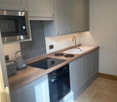 Wymondham House | Luxury barn Retreat - sleeps 2-4, quiet location with parking