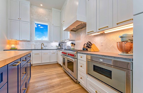 Plantation House | Luxury Beachfront home with a private, Hot Tub and Elevator