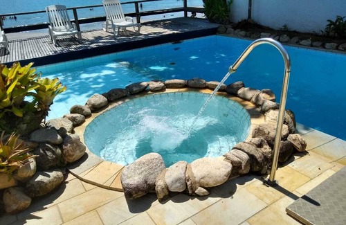 Praia da Fortaleza House | Luxury Beach house standing in front sand sea, pool and terrace