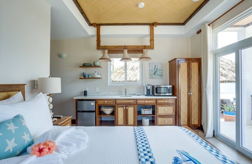 Placencia Resort | Luxury Beachfront Cabana with swim up pool bar