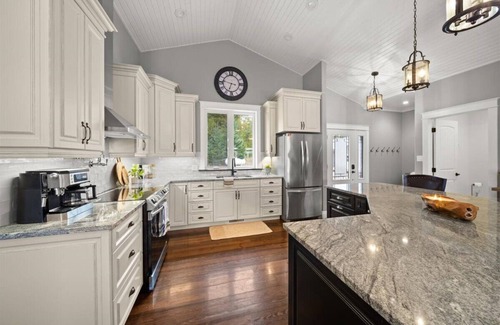 Whitewater Region House | Luxury Beachfront Cottage w Hot tub, Sauna & Bar