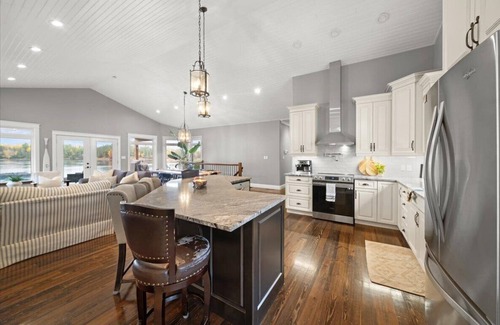 Whitewater Region House | Luxury Beachfront Cottage w Hot tub, Sauna & Bar