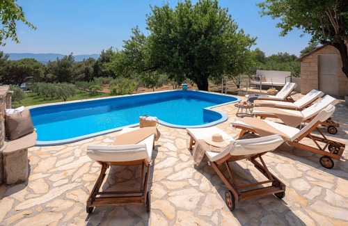 Bol Villa | Luxury Beachfront Villa Zlatni Rat With Pool at the Beach Zlatni Rat in Bol on Island of Brac