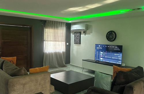 Ofin Apartment | Luxury Brown-Themed Apartment with Balcony Views & Comfort