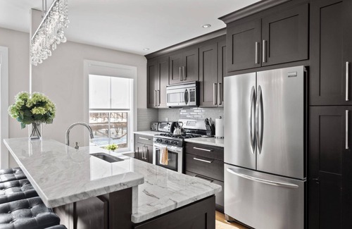 Columbus Condo | Luxury Brownstone Condos with Private Roofdeck & Stunning City Views!