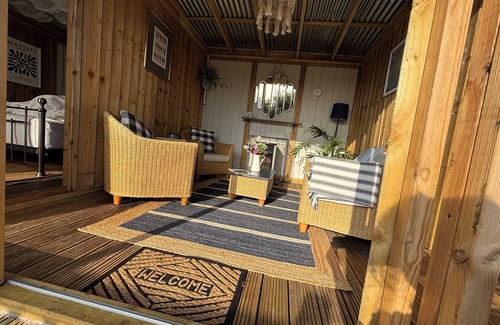 Freathy RV Rental | Luxury Cabin Coastal Luxury: with Private Deck - Ebb & Flow Getaway