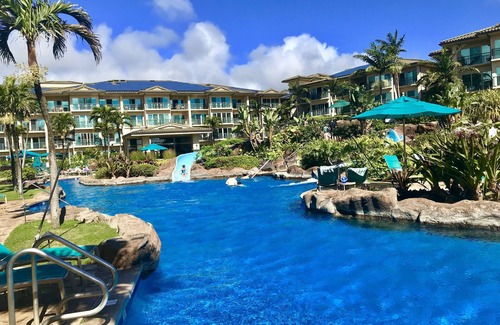 Kapaa Condo | Luxury Condo-2Waterslides, 3 hottubs, huge pool, BBQ’s, AC, WiFi & 3-75” TV’s