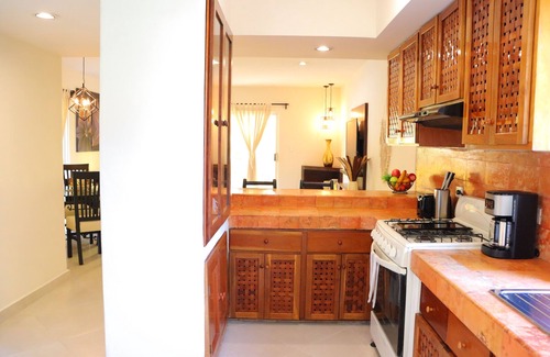 Playacar Condo | Luxury Condo Close to the beach,Tropical Setting,Garden Patio, Golf Club Nearby