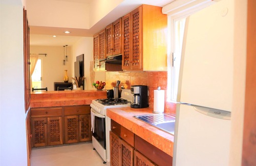 Playacar Condo | Luxury Condo Close to the beach,Tropical Setting,Garden Patio, Golf Club Nearby