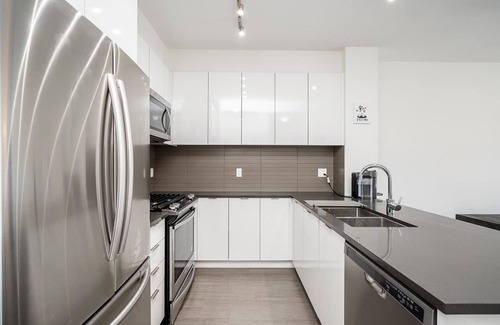 Surrey Condo | Luxury condo living, top floor furnished 1 bd 1 bath with outdoor pool