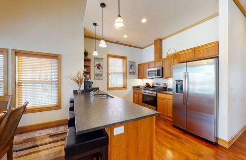 Dover Bay Condo | Luxury condo with private deck, pond views, fast WiFi, boat launch & more