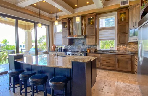 Clewiston House | Luxury Construction, Heated Pool on Canal, 3 Minute Walk to sugar sand of FMB!