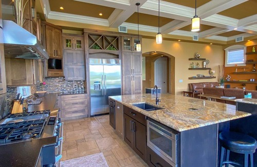 Clewiston House | Luxury Construction, Heated Pool on Canal, 3 Minute Walk to sugar sand of FMB!