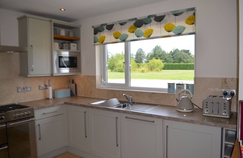 Liverton House | Luxury Contemporary Wooden Lodge Set In Rural Landscape With Garden And Parking