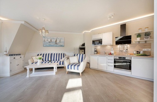 Zingst Apartment | Luxury vacation apartment right by the sea with sauna and fireplace.