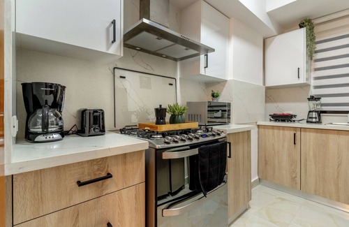 Ensanche Naco Condo | Luxury Downtown Stay ~ 11th FL ~ Jacuzzi, Gym, City Views @Naco