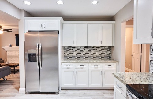 Sun Bay South House | Luxury Dream Getaway: Heated Pool House in Prime Location!