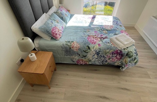 Sandyford Apartment | Luxury en-suite large king size bedroom by Dublin Sandyford Mountain Views.