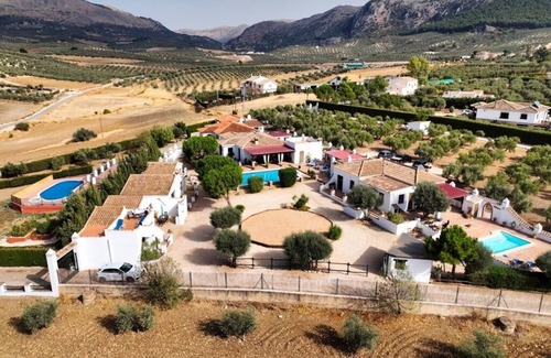 Villanueva del Trabuco Apartment | Luxury holiday retreat, 2 swimming pools, jacuzzi, free fast Wi-Fi, Equestrian.