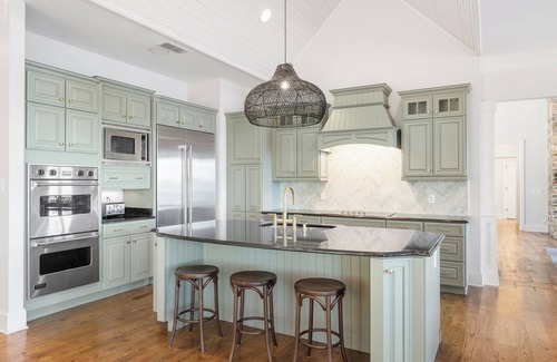 Winchester House | Luxury Estate Center of Tims Ford Lake with Unbeatable Lakefront Views, Dock