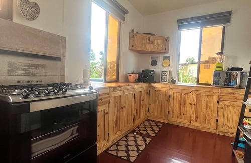 Noord House | Luxury European-Surinamese style upstairs apartment with large terrace.