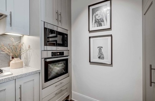 Central Waterfront Condo | Luxury Executive Suite on the water with pools