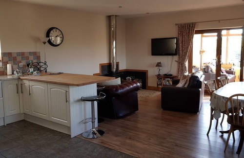 Lochmaben Cottage | Luxury Farm Cottage - Garden, Games/Sun Lounge Patio with furniture